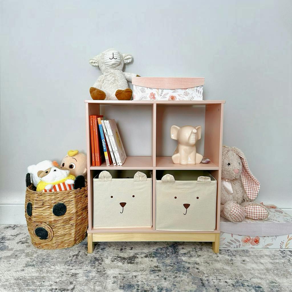 Organized playroom shelf with plush toys, books, and whimsical storage for children.